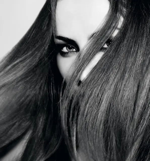 Close-up of a person’s hair and scalp