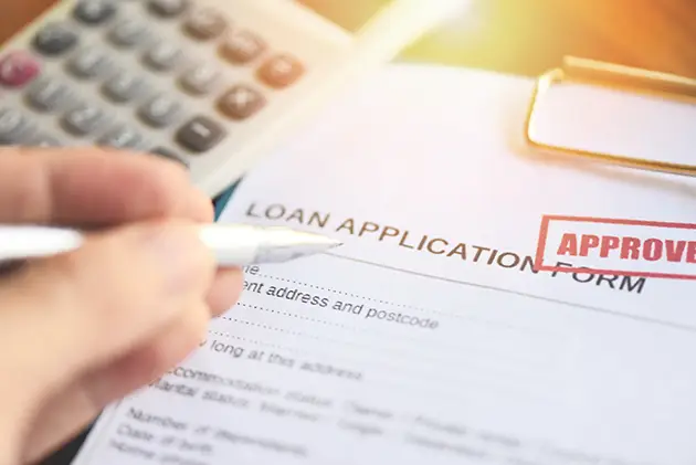 A loan application form under review — Cinner v. Xactus FCRA class action settlement over merged infile credit reports sold to mortgage lenders