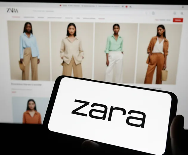 Zara logo on a phone in front of the Zara website — tariff refund class action lawsuit alleging Zara passed IEEPA tariff costs to shoppers through higher prices